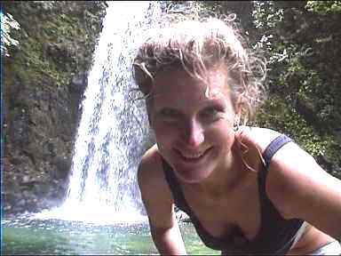 Getting ready for a swim in wonderful waterfall lagoon in Miravalles, Costa Rica