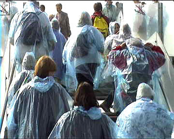 Most everyone wore a raincoat due to the spray on "blur". You could buy a poncho before entering