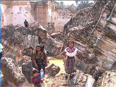 Maya children in impressive Antigua "La Recolleccion" Cathedral earthquake ruins