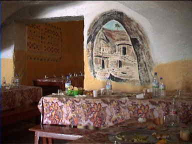 We had lunch in this underground restaurant. On the wall's a painting of an underground house