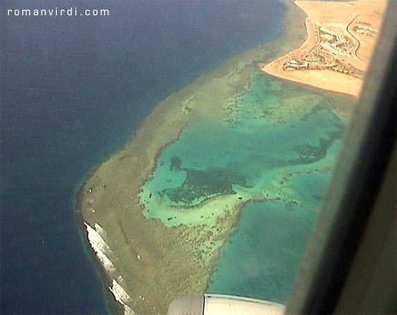 Turquoise water of the Straits of Tiran (Ras Nasrani, near the 
airport) from the air