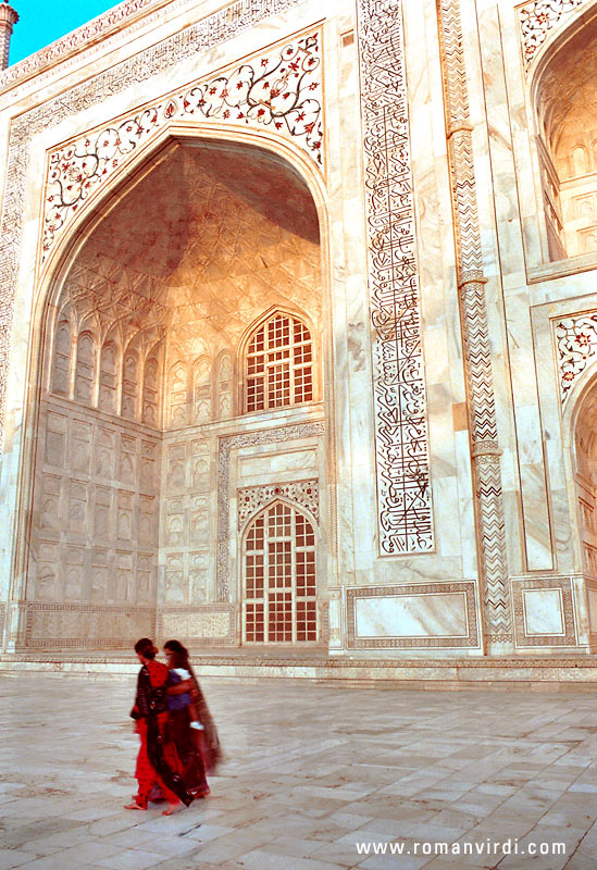 The left side of the Taj under the setting sun. Look at all the inlays (the decorations are semi-precious stone inlays in the marble, not paintings!)