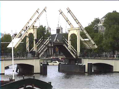 The 'Magere Brug' while opening, usually a rare sight. The thin bridge is supposed to be the most photographed bridge in town