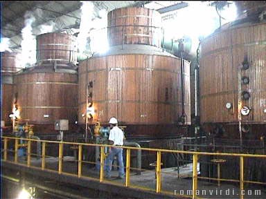 Huge vats in the sugar mill