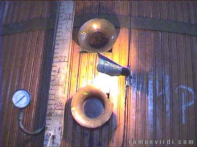 Monitoring instruments on one of the huge vats inside the sugar mill outside Laranjeiras