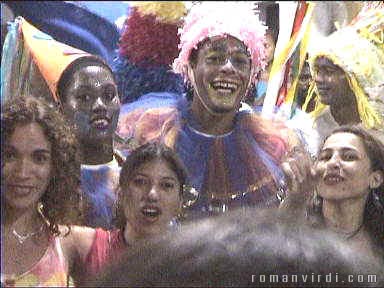 Posing for a photograph (you can see the cameraman's hair at the bottom of the picture) at Pelourinho Carnival