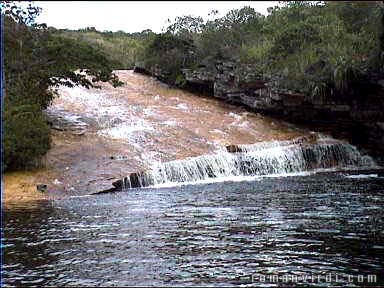 Falls over huge slanting rock slab at Mucugezinho