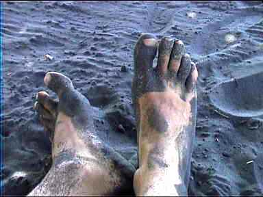 Jet-black sand at Puerto Viejo beach, Costa Rica