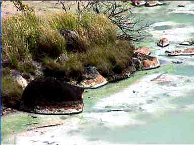 Pond discoloured by volcanic activity