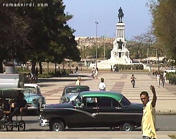 Gleaming restored old-timer in front of Museo de la Revolucion