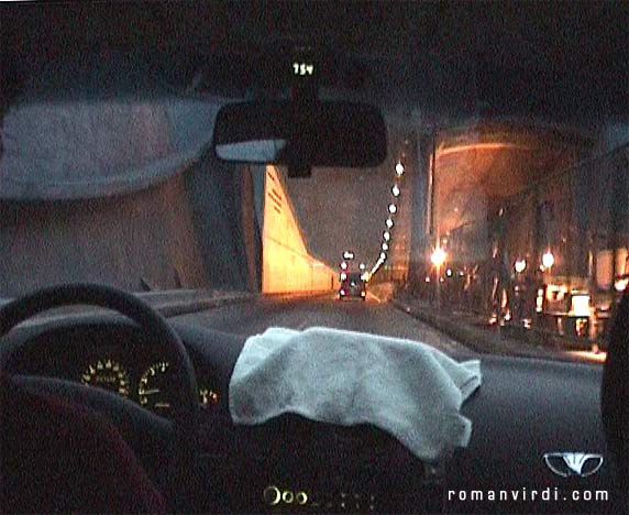 Driving through Havana tunnel in taxi with towel over meter
