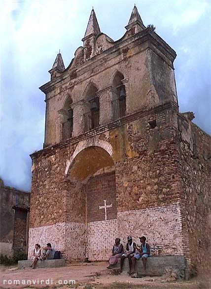 Cubans relaxing at closed church on way to Trinidad hilltop