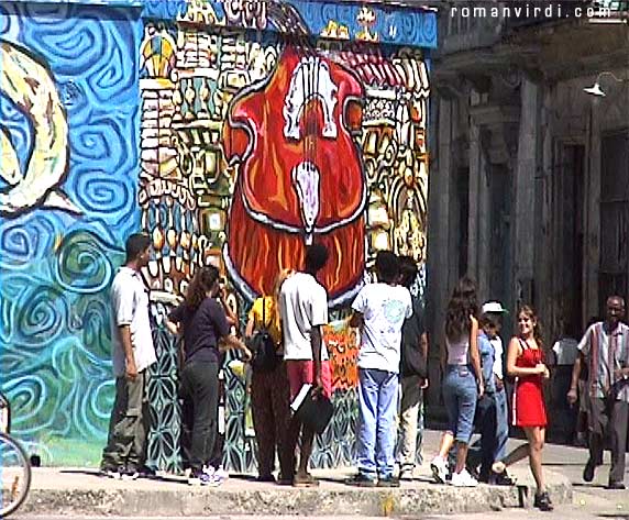 Another mural, being inspected