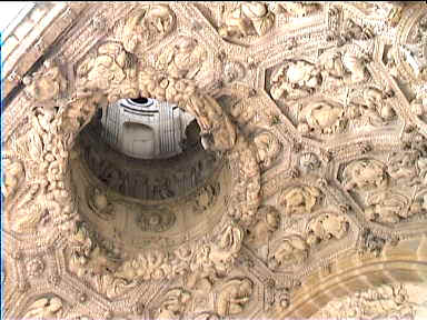 The carving under the large middle doorway of ñglise St-Michel has an opening to the small tower above (you can see it in the picture at left)