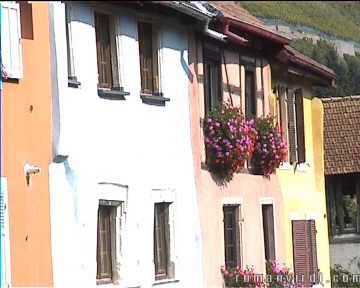 Multicolored Thann houses by the riverside