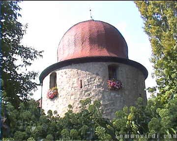 The Witches Tower dating from 1411 with gun loopholes and it's onion dome from 1628