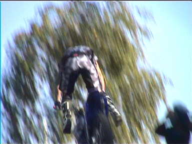 FMX rider Preparing to land on his bike (all landed safely)