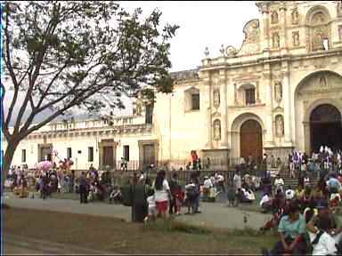 Bustling square outside Antigua's Catedral de Santiago at Parque Central