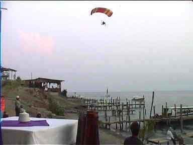 Noisy motorized Paraglider over lake Atitlan