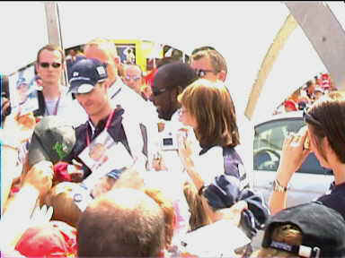 Ralf Schumacher giving autographs. I was too far away to get one