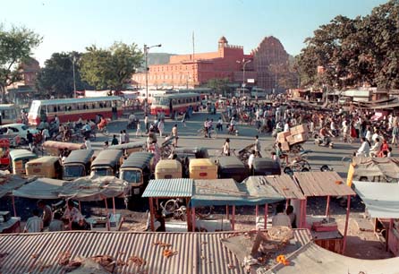 A busy intersection. The Palace of the Winds is at the top right