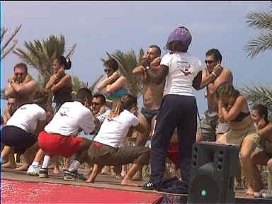 This animation involved tourists pulling their ears and doing knee-bends to the beat of the music. It's amazing what group-pressure can make you do! :-)