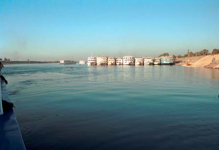 Egyptians have a great way of lining up boats at a harbour. Passengers from boats not berthed on the shore need to pass through all the boats in between!