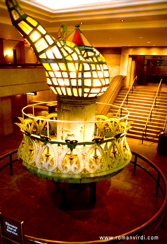 The original torch of the statue of liberty, illuminated internally, is in the museum on Liberty Island. The current torch is covered with gold leaf and needs no illumination