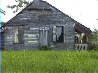 Typical Caribbean wood house on the way to the airport