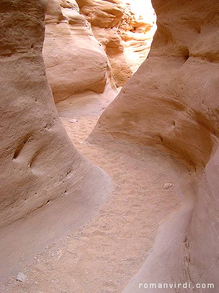 The Coloured Canyon is mostly a dried out riverbed cut through the rock. The trek starts at about 770m above sea level and descends to about 570m