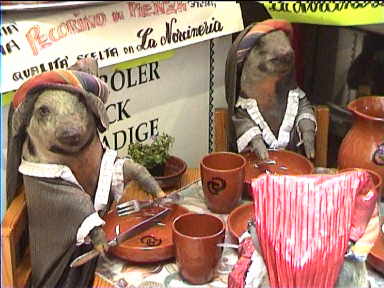 Dining piggies in a butcher's window