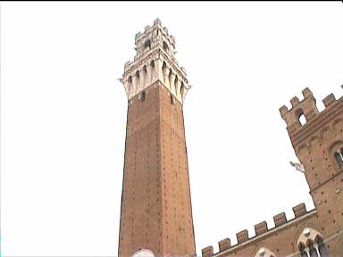 Towering Torre del Magia at Il Campo, Siena