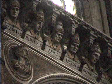 Inside the Duomo, statues of the popes